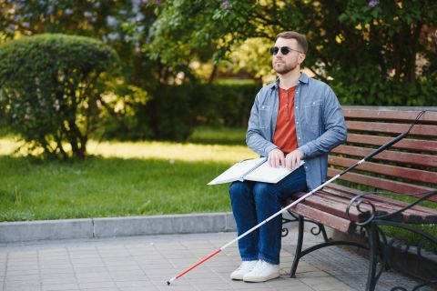 blind man sitting on a bench, Photos - Envato Elements